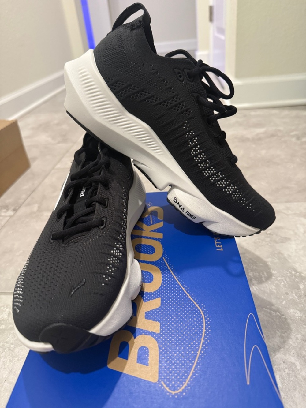 Brooks Black and White Athletic Sneakers